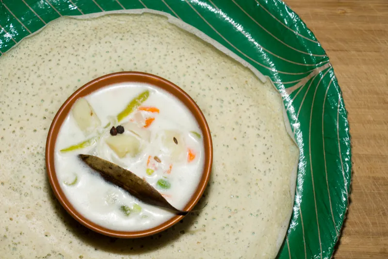 South Indian dish with stew and dosa.